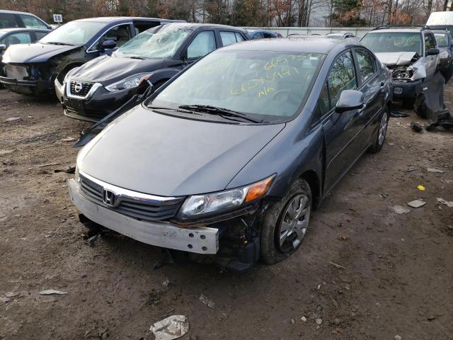 Photo 1 VIN: 19XFB2F58CE339393 - HONDA CIVIC LX 