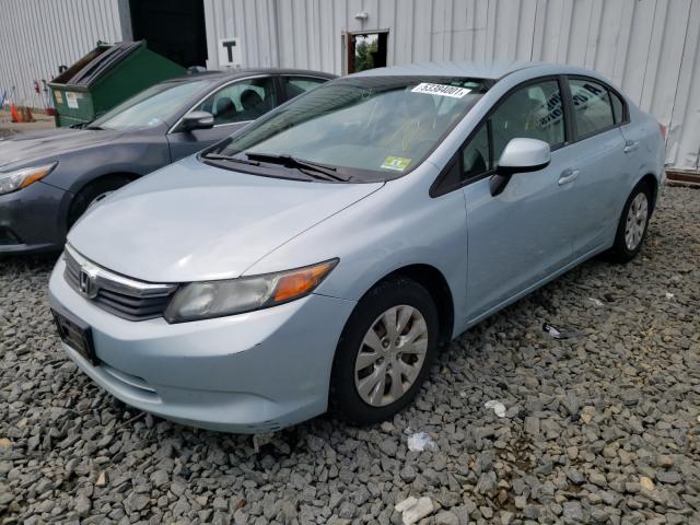 Photo 1 VIN: 19XFB2F58CE350801 - HONDA CIVIC LX 