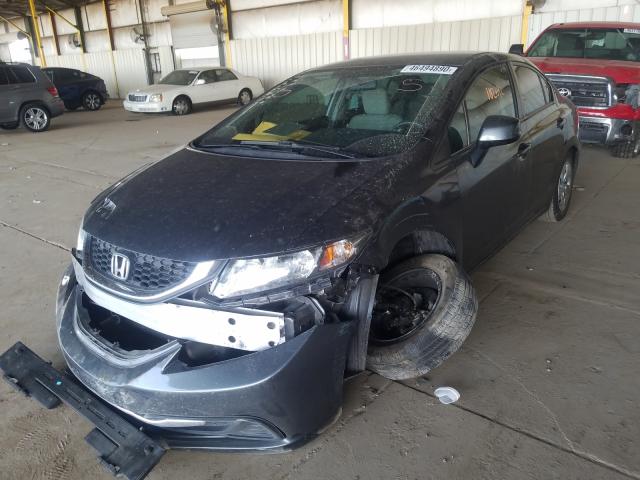 Photo 1 VIN: 19XFB2F58DE056638 - HONDA CIVIC LX 