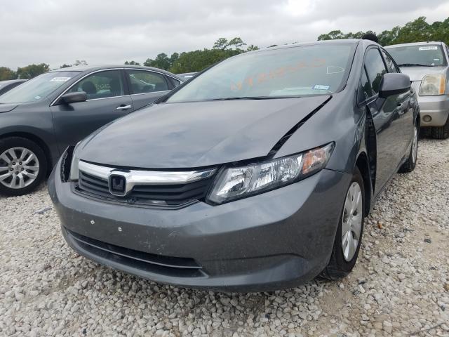 Photo 1 VIN: 19XFB2F59CE014705 - HONDA CIVIC LX 