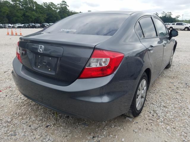 Photo 3 VIN: 19XFB2F59CE014705 - HONDA CIVIC LX 