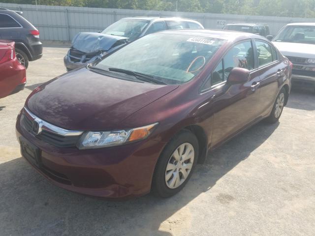 Photo 1 VIN: 19XFB2F59CE031522 - HONDA CIVIC LX 