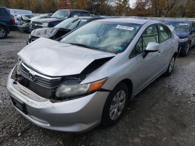 Photo 1 VIN: 19XFB2F59CE033061 - HONDA CIVIC LX 