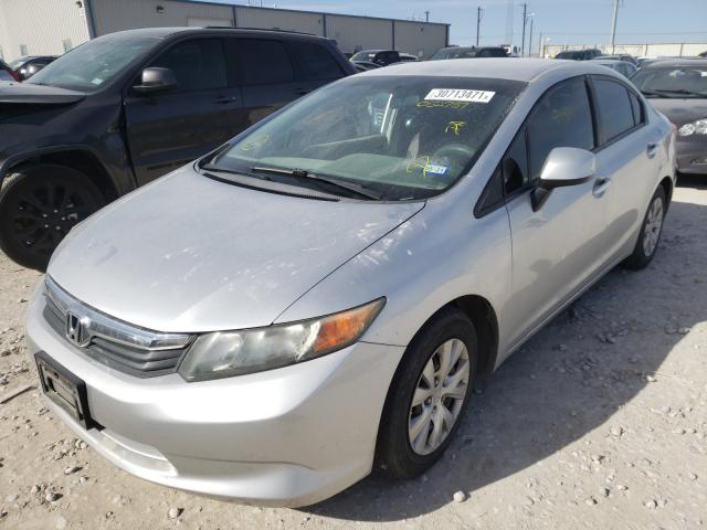 Photo 1 VIN: 19XFB2F59CE052757 - HONDA CIVIC LX 