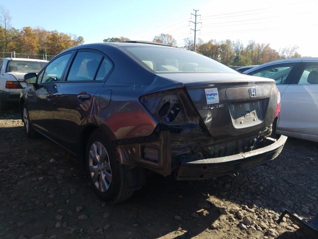 Photo 2 VIN: 19XFB2F59CE065055 - HONDA CIVIC LX 