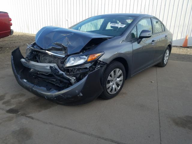 Photo 1 VIN: 19XFB2F59CE098850 - HONDA CIVIC LX 