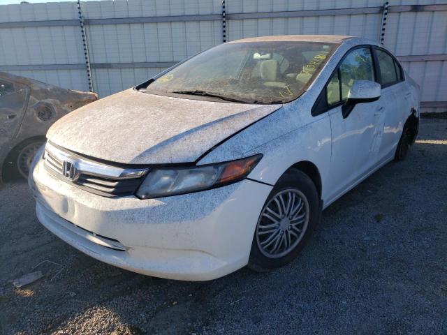 Photo 1 VIN: 19XFB2F59CE099562 - HONDA CIVIC LX 