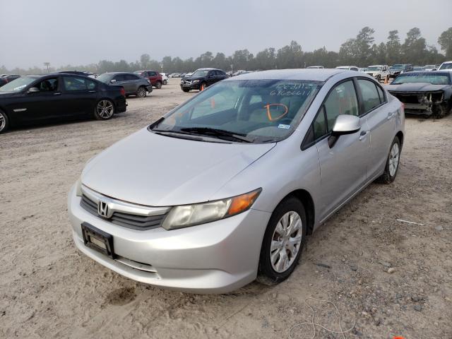 Photo 1 VIN: 19XFB2F59CE101407 - HONDA CIVIC LX 