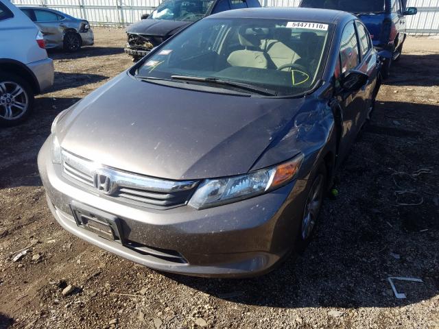 Photo 1 VIN: 19XFB2F59CE103710 - HONDA CIVIC LX 