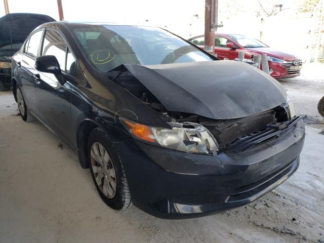 Photo 0 VIN: 19XFB2F59CE105215 - HONDA CIVIC LX 