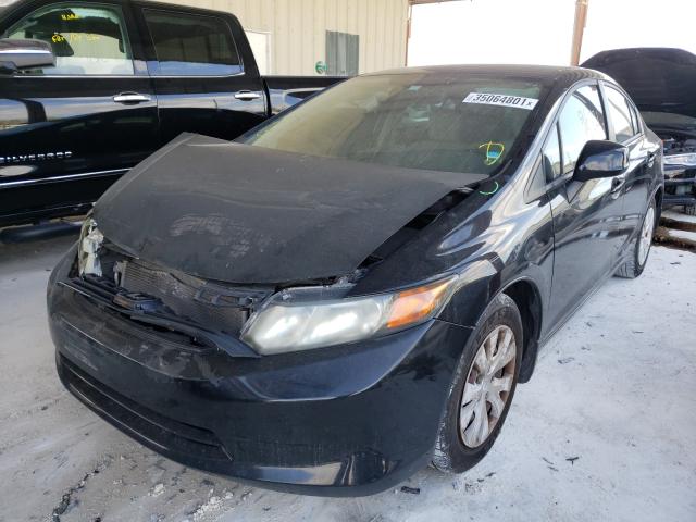 Photo 1 VIN: 19XFB2F59CE105215 - HONDA CIVIC LX 