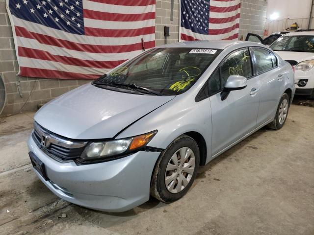 Photo 1 VIN: 19XFB2F59CE303308 - HONDA CIVIC LX 