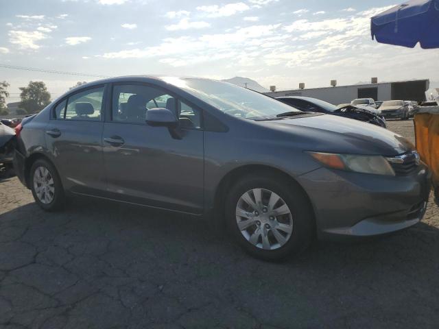 Photo 3 VIN: 19XFB2F59CE305978 - HONDA CIVIC LX 