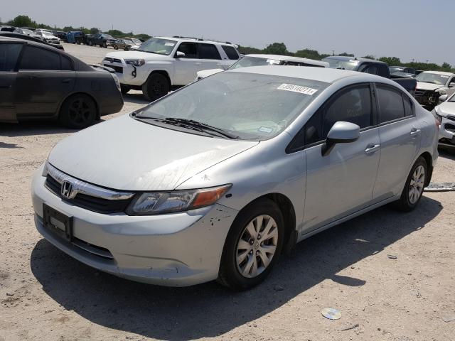 Photo 1 VIN: 19XFB2F59CE330637 - HONDA CIVIC LX 