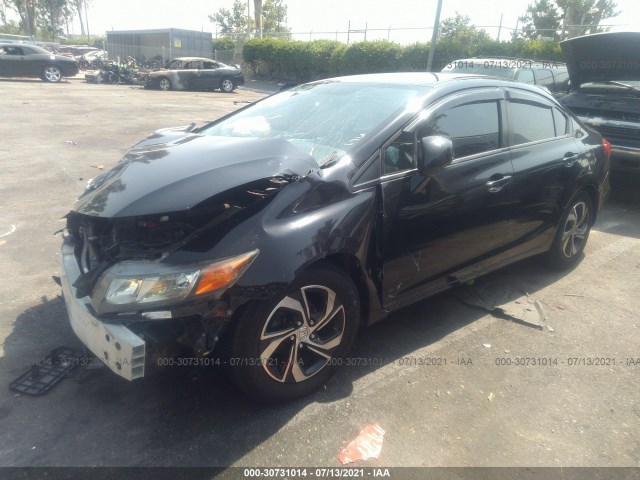 Photo 1 VIN: 19XFB2F59CE330850 - HONDA CIVIC SDN 