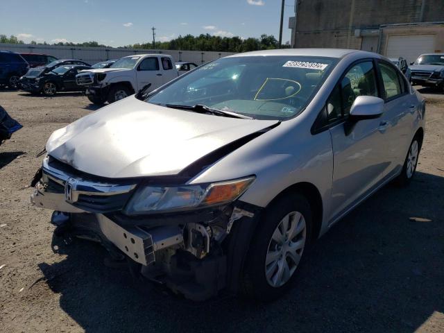 Photo 1 VIN: 19XFB2F59CE337040 - HONDA CIVIC LX 