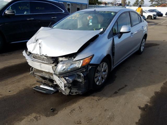 Photo 1 VIN: 19XFB2F59CE345364 - HONDA CIVIC LX 