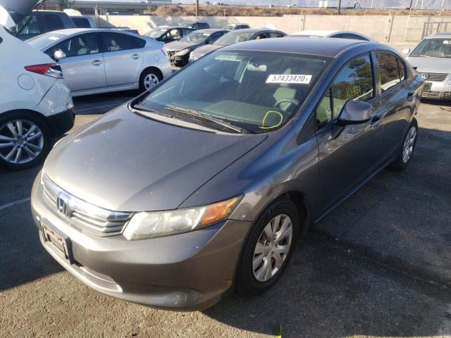 Photo 1 VIN: 19XFB2F59CE347258 - HONDA CIVIC LX 