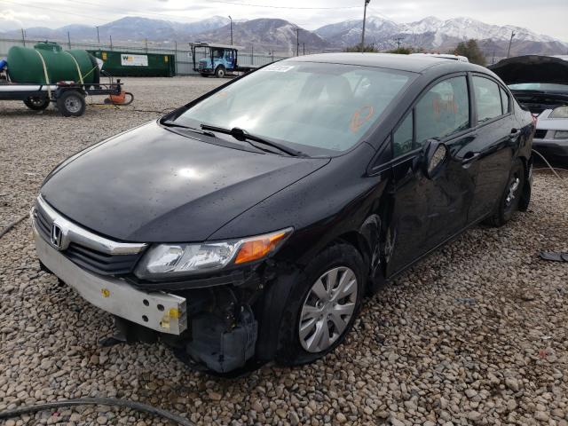 Photo 1 VIN: 19XFB2F59CE351410 - HONDA CIVIC LX 