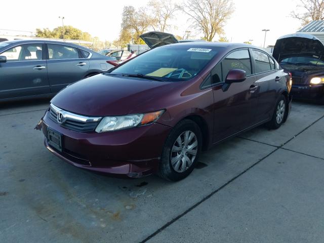 Photo 1 VIN: 19XFB2F59CE389672 - HONDA CIVIC LX 