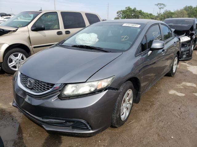 Photo 1 VIN: 19XFB2F59DE028704 - HONDA CIVIC LX 