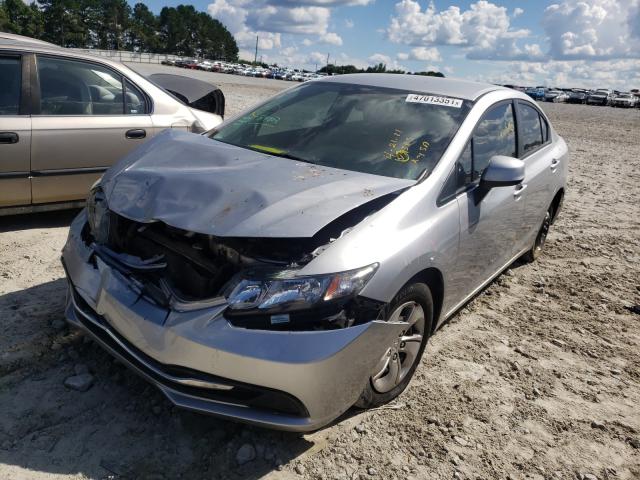 Photo 1 VIN: 19XFB2F59DE089583 - HONDA CIVIC LX 