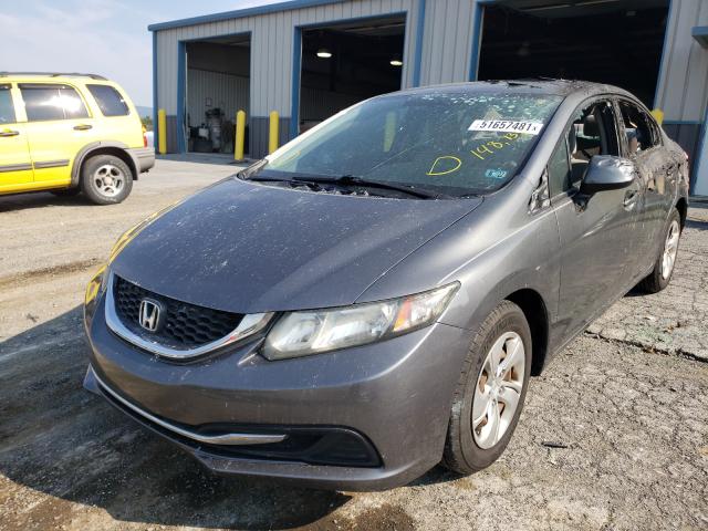 Photo 1 VIN: 19XFB2F59DE205784 - HONDA CIVIC LX 