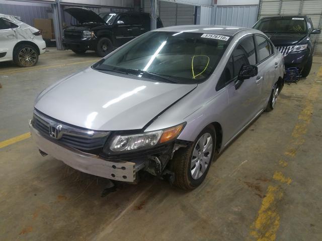 Photo 1 VIN: 19XFB2F5XCE011098 - HONDA CIVIC LX 