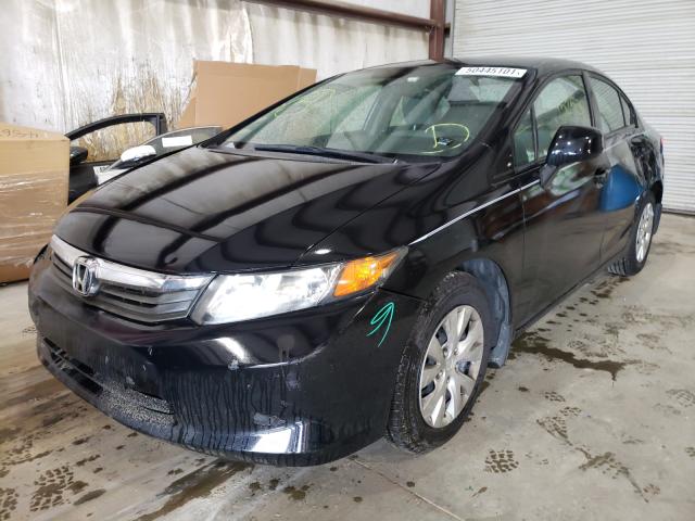 Photo 1 VIN: 19XFB2F5XCE077697 - HONDA CIVIC LX 