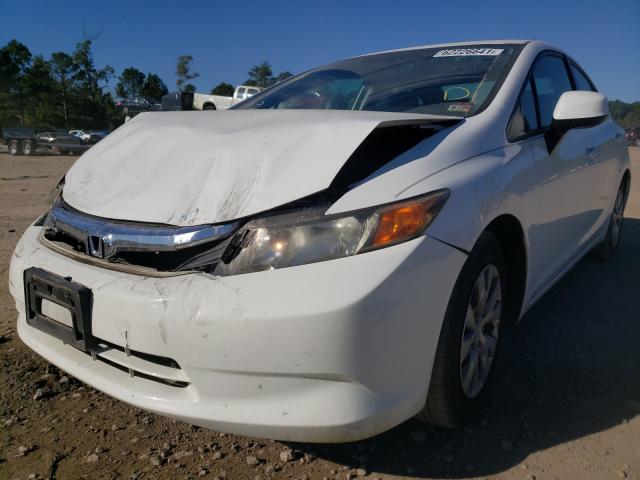 Photo 1 VIN: 19XFB2F5XCE099392 - HONDA CIVIC LX 