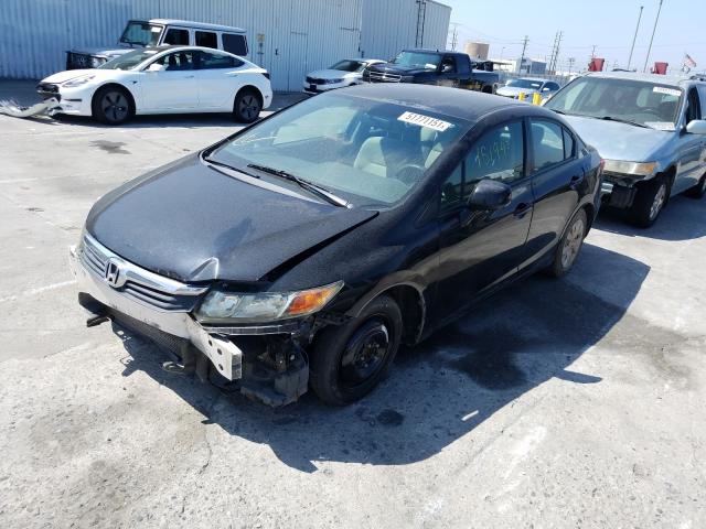 Photo 1 VIN: 19XFB2F5XCE304600 - HONDA CIVIC LX 