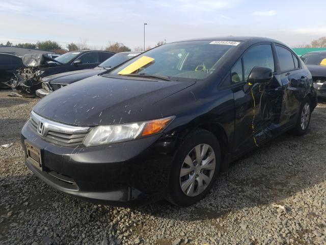 Photo 1 VIN: 19XFB2F5XCE330940 - HONDA CIVIC LX 