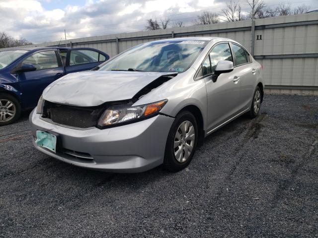 Photo 1 VIN: 19XFB2F5XCE360133 - HONDA CIVIC LX 