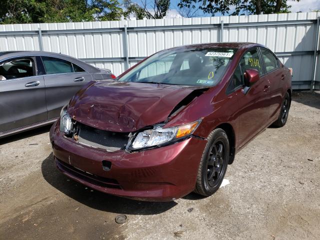 Photo 1 VIN: 19XFB2F5XCE377272 - HONDA CIVIC LX 