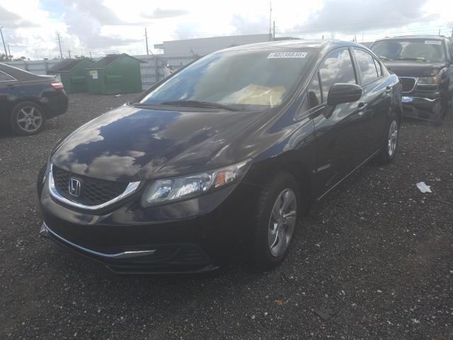 Photo 1 VIN: 19XFB2F5XEE059283 - HONDA CIVIC LX 