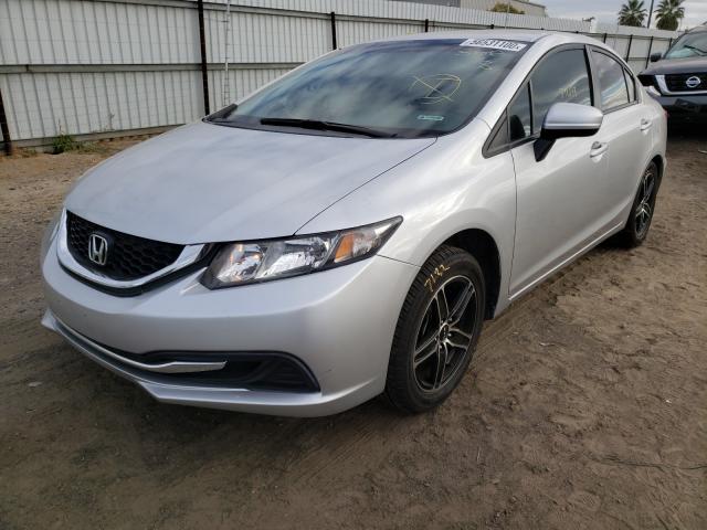 Photo 1 VIN: 19XFB2F5XEE227973 - HONDA CIVIC LX 