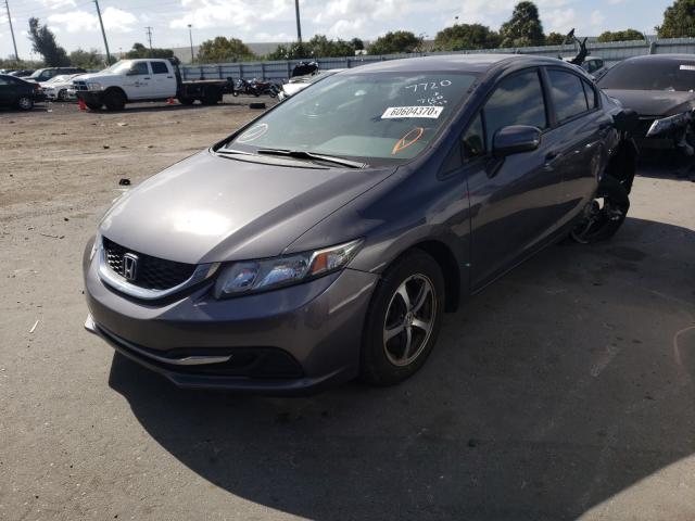 Photo 1 VIN: 19XFB2F73FE057720 - HONDA CIVIC SE 