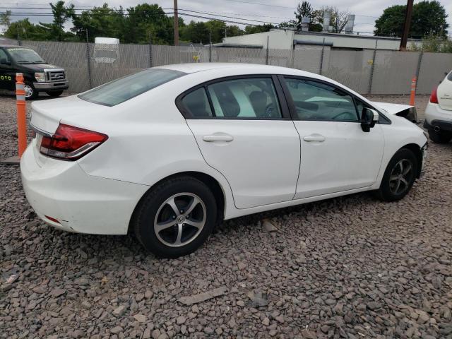 Photo 2 VIN: 19XFB2F73FE257299 - HONDA CIVIC SE 