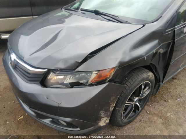 Photo 5 VIN: 19XFB2F81CE005555 - HONDA CIVIC SDN 