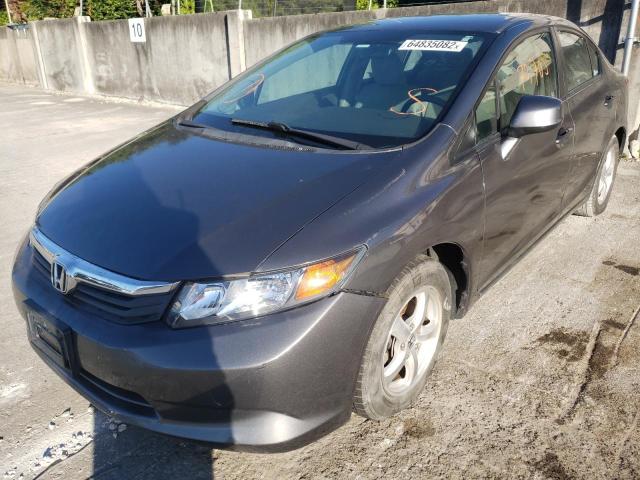 Photo 1 VIN: 19XFB5F58CE000148 - HONDA CIVIC SDN 