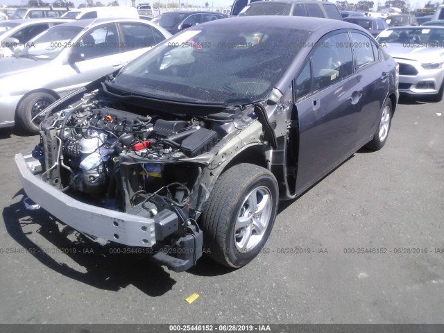 Photo 1 VIN: 19XFB5F59EE000677 - HONDA CIVIC SEDAN 