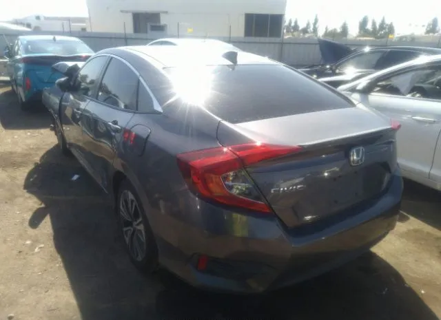 Photo 2 VIN: 19XFC1F33GE202597 - HONDA CIVIC SEDAN 