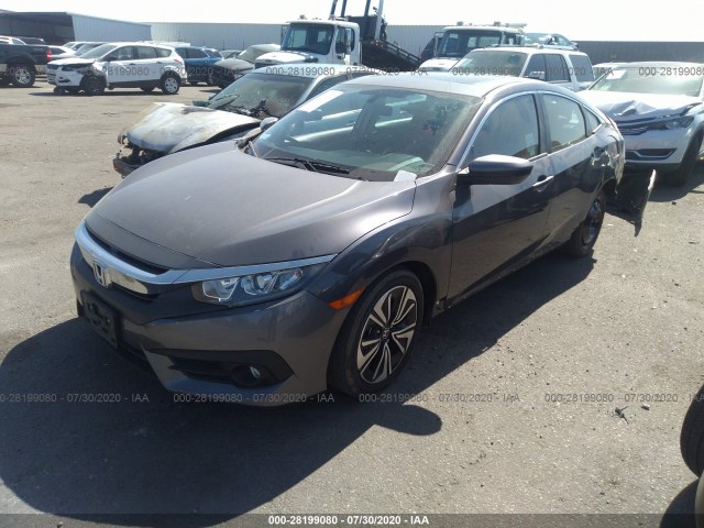 Photo 1 VIN: 19XFC1F33GE211168 - HONDA CIVIC SEDAN 