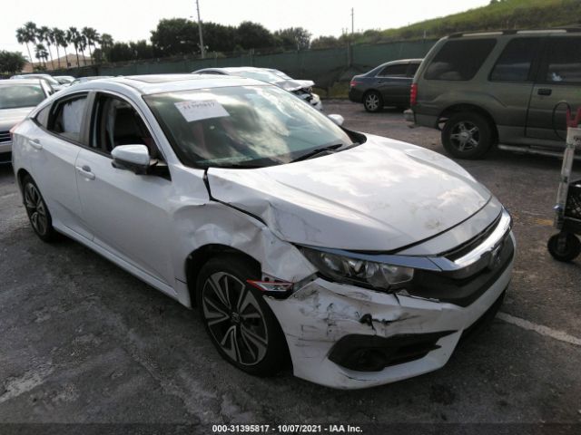 Photo 5 VIN: 19XFC1F39GE025067 - HONDA CIVIC SEDAN 