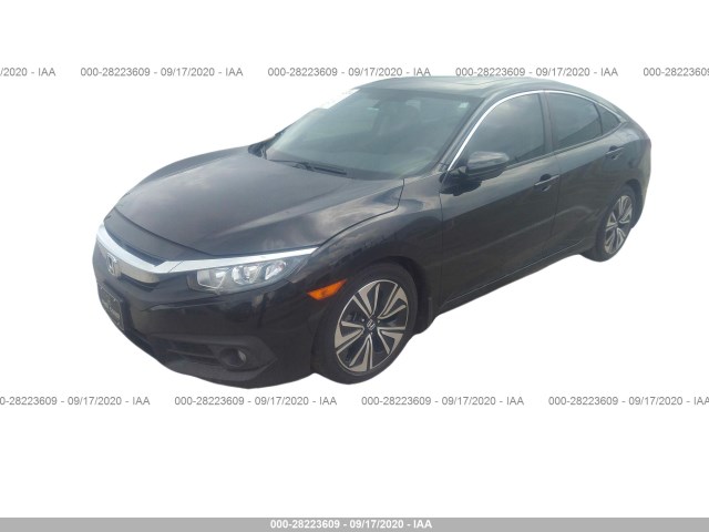 Photo 1 VIN: 19XFC1F3XGE000632 - HONDA CIVIC SEDAN 