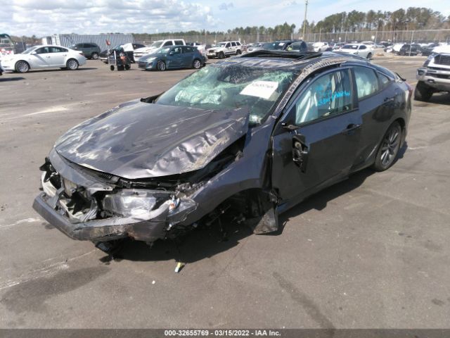 Photo 1 VIN: 19XFC1F3XKE001062 - HONDA CIVIC SEDAN 