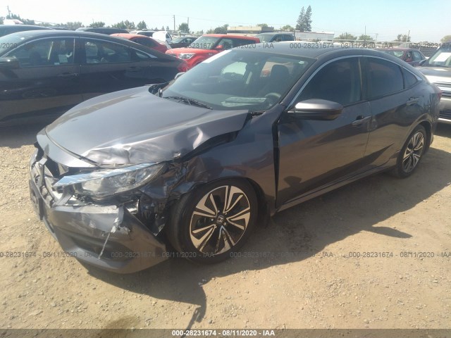 Photo 1 VIN: 19XFC1F4XGE215310 - HONDA CIVIC SEDAN 