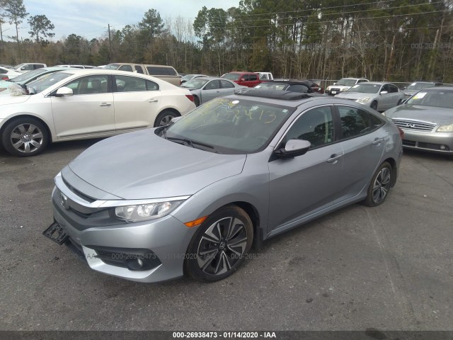 Photo 1 VIN: 19XFC1F70GE030127 - HONDA CIVIC SEDAN 