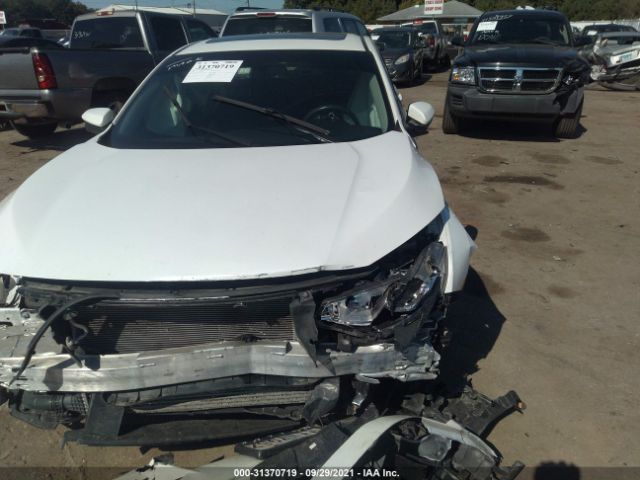 Photo 9 VIN: 19XFC1F75GE034027 - HONDA CIVIC SEDAN 