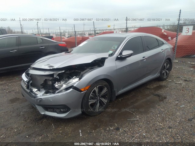 Photo 1 VIN: 19XFC1F90HE020703 - HONDA CIVIC SEDAN 